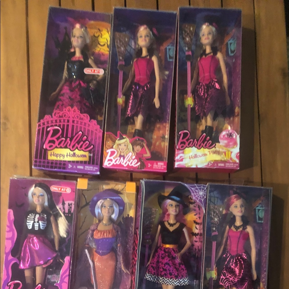 7 new in box Barbie Halloween dolls